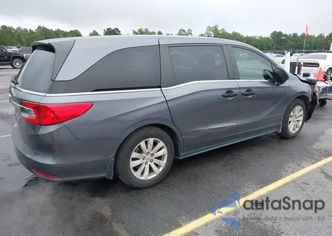 2018 Honda Odyssey Lx z USA, uszkodzony, nr VIN 5FNRL6H21JB034782